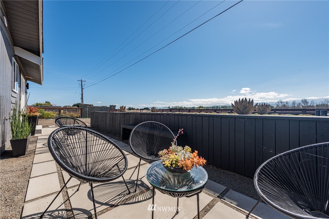 271 3 Crabs Road Sequim, WA 98382 - Photo 22 of 40 a view of a balcony with furniture