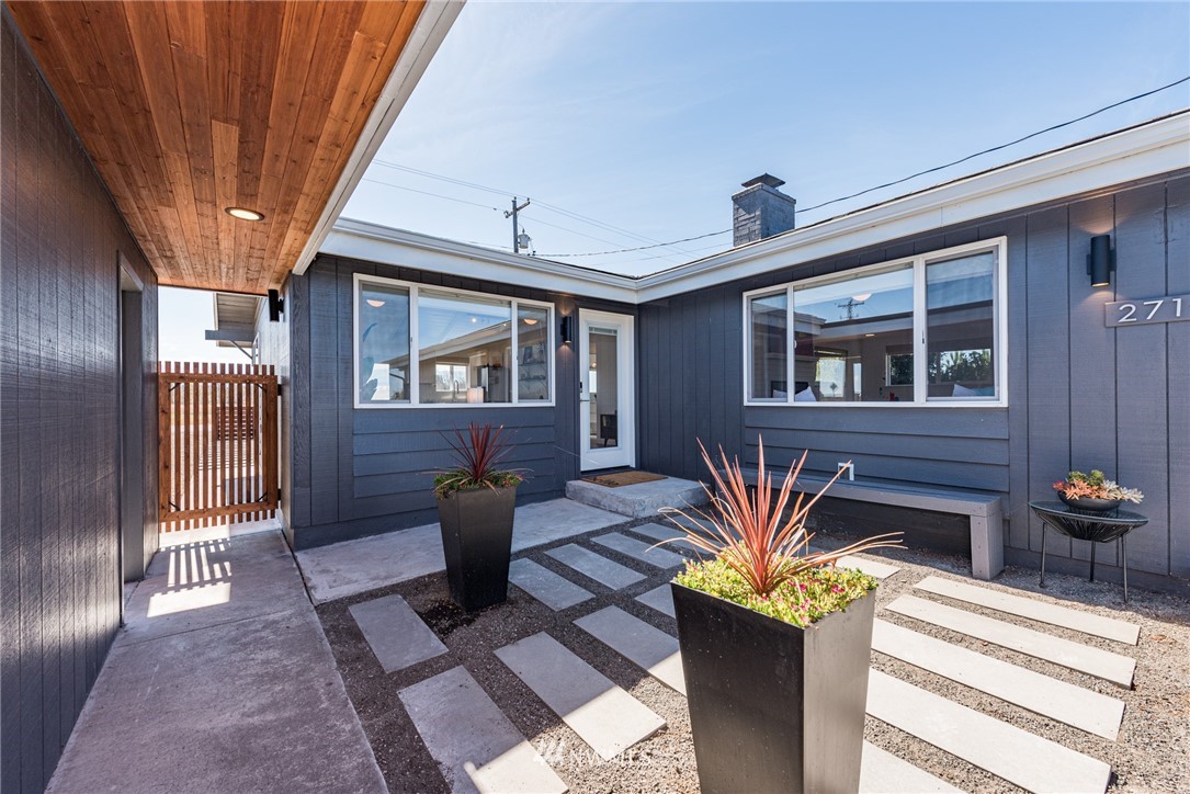 271 3 Crabs Road Sequim, WA 98382 - Photo 23 of 40 a view of a porch with furniture and a window