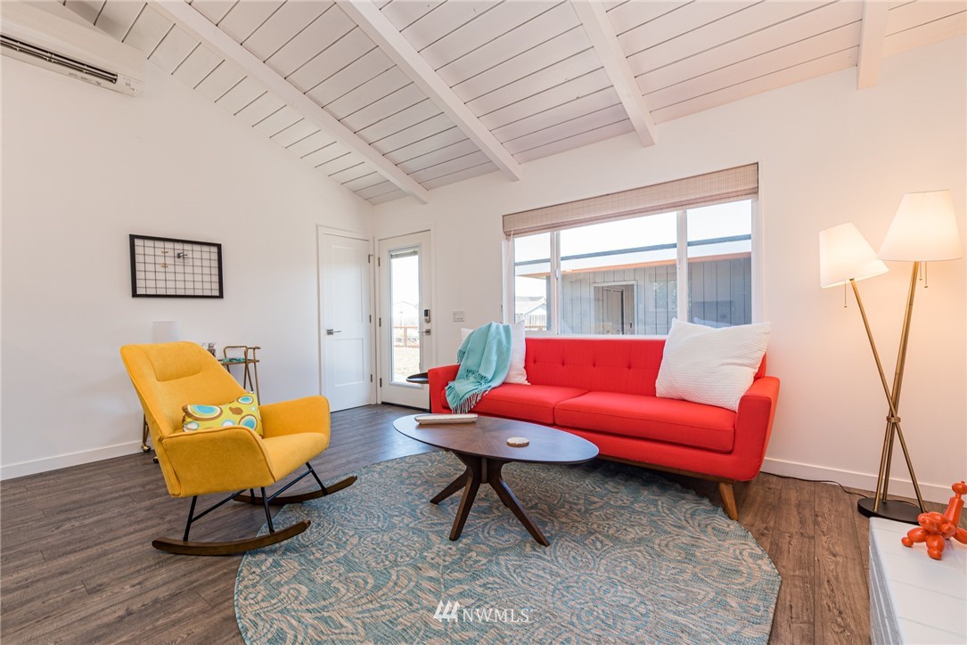 271 3 Crabs Road Sequim, WA 98382 - Photo 24 of 40 a living room with furniture and a rug