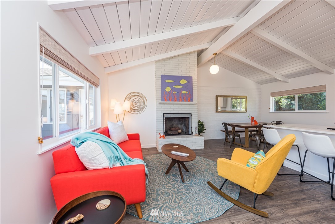 271 3 Crabs Road Sequim, WA 98382 - Photo 25 of 40 a living room with furniture and a fireplace