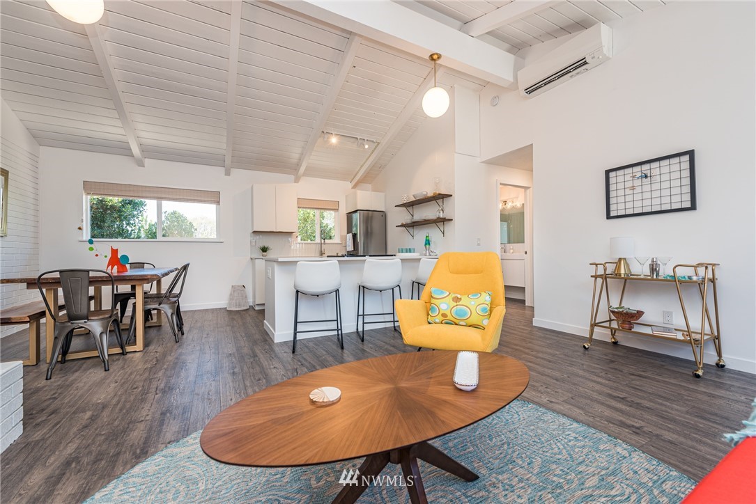 271 3 Crabs Road Sequim, WA 98382 - Photo 26 of 40 a living room with dining room and wooden floor