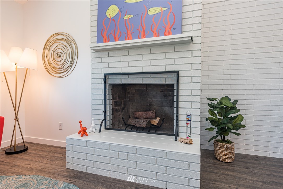271 3 Crabs Road Sequim, WA 98382 - Photo 28 of 40 a living room with furniture and a fireplace
