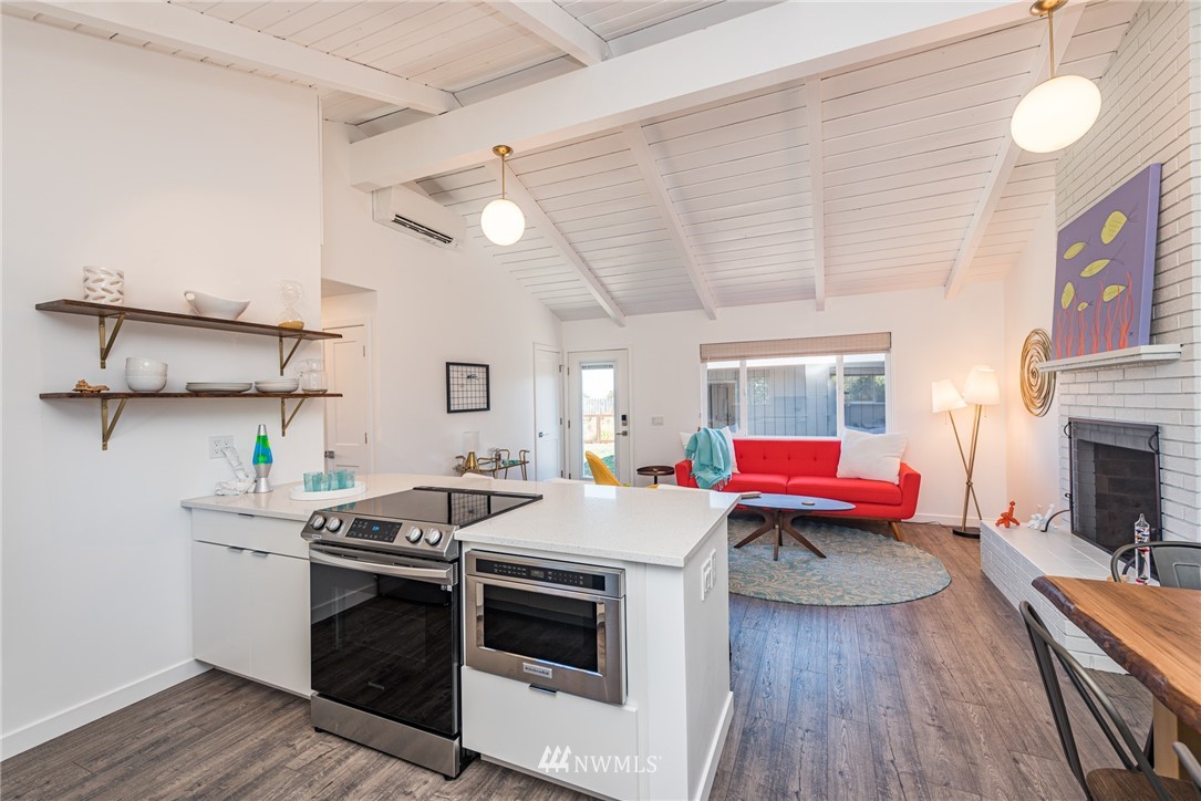 271 3 Crabs Road Sequim, WA 98382 - Photo 31 of 40 a kitchen that has a lot of cabinets in it