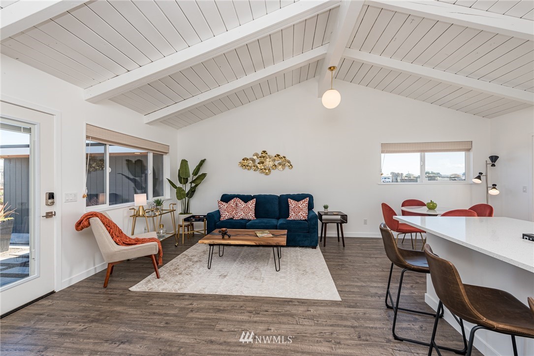 271 3 Crabs Road Sequim, WA 98382 - Photo 6 of 40 a living room with furniture a chandelier fan and a window