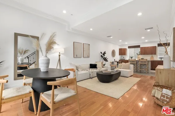 a living room with furniture and a table