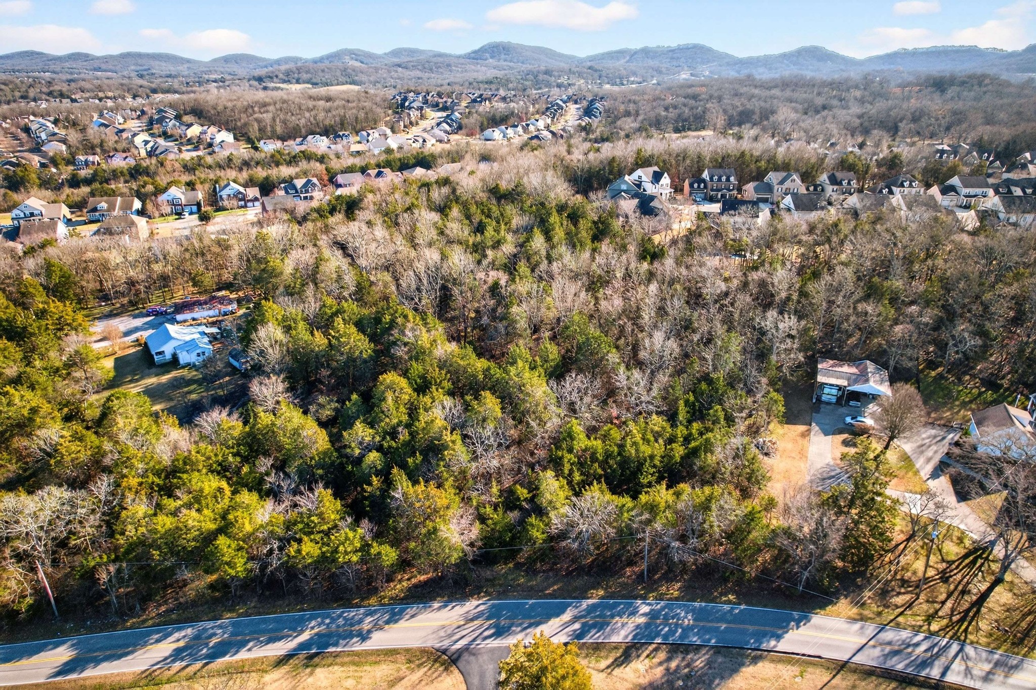 9877 Sam Donald Road Nolensville, TN 37135 - Photo 24 of 37 an aerial view of residential house with parking space