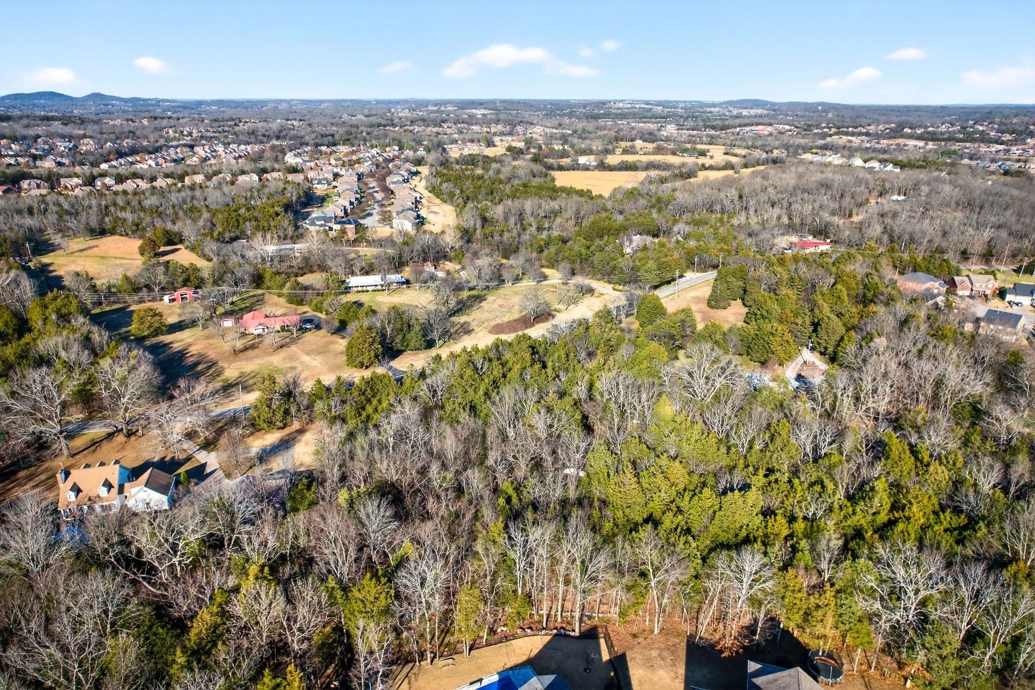 9877 Sam Donald Road Nolensville, TN 37135 - Photo 32 of 37 an aerial view of residential building with parking space