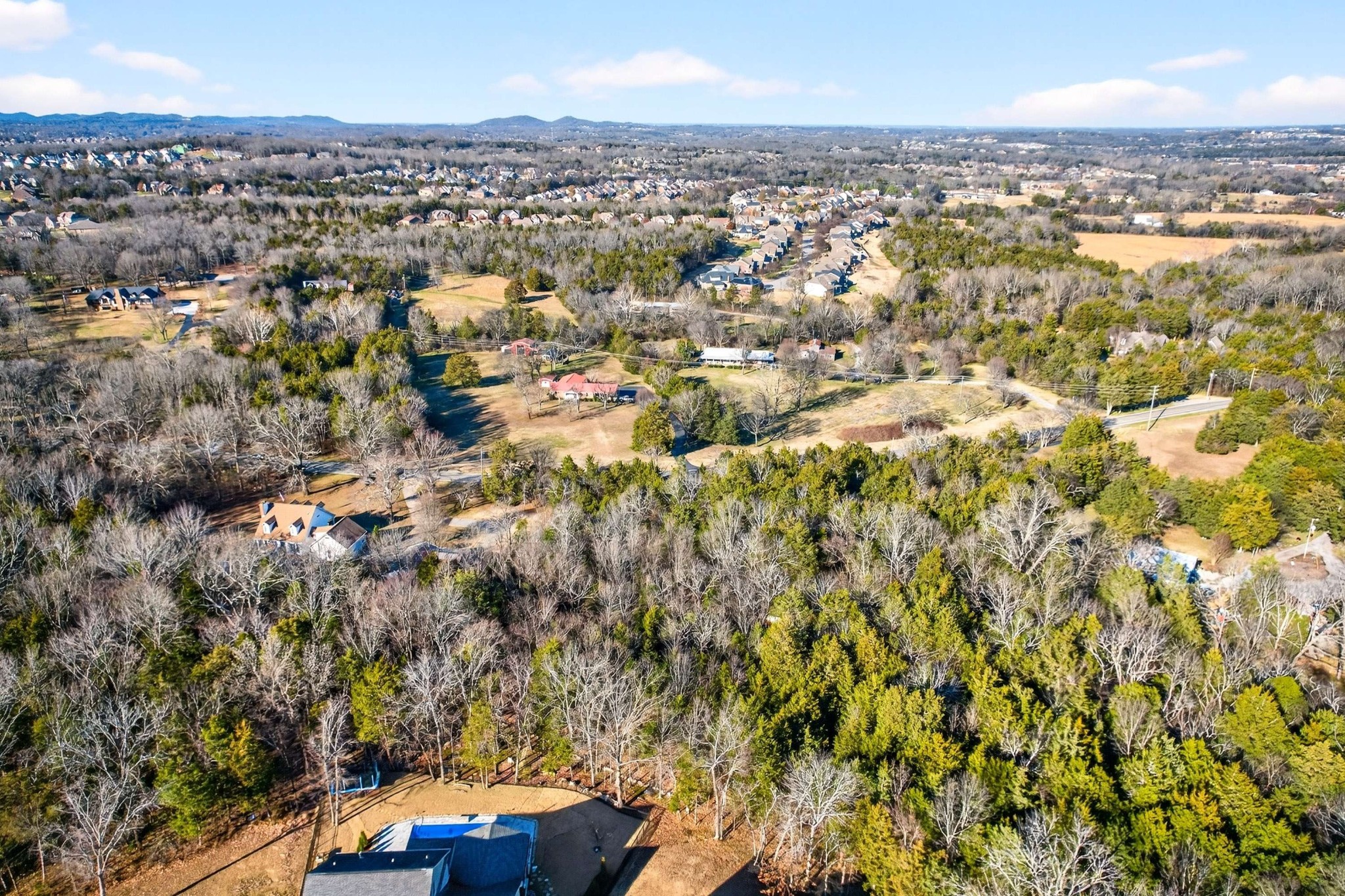 9877 Sam Donald Road Nolensville, TN 37135 - Photo 33 of 37 an aerial view of residential house with parking space