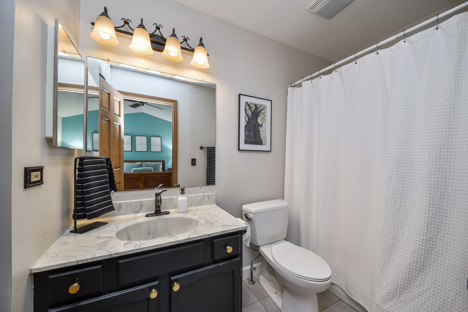 27W108 Walnut Drive Winfield, IL 60190 - Photo 11 of 20 a bathroom with a granite countertop sink and a toilet