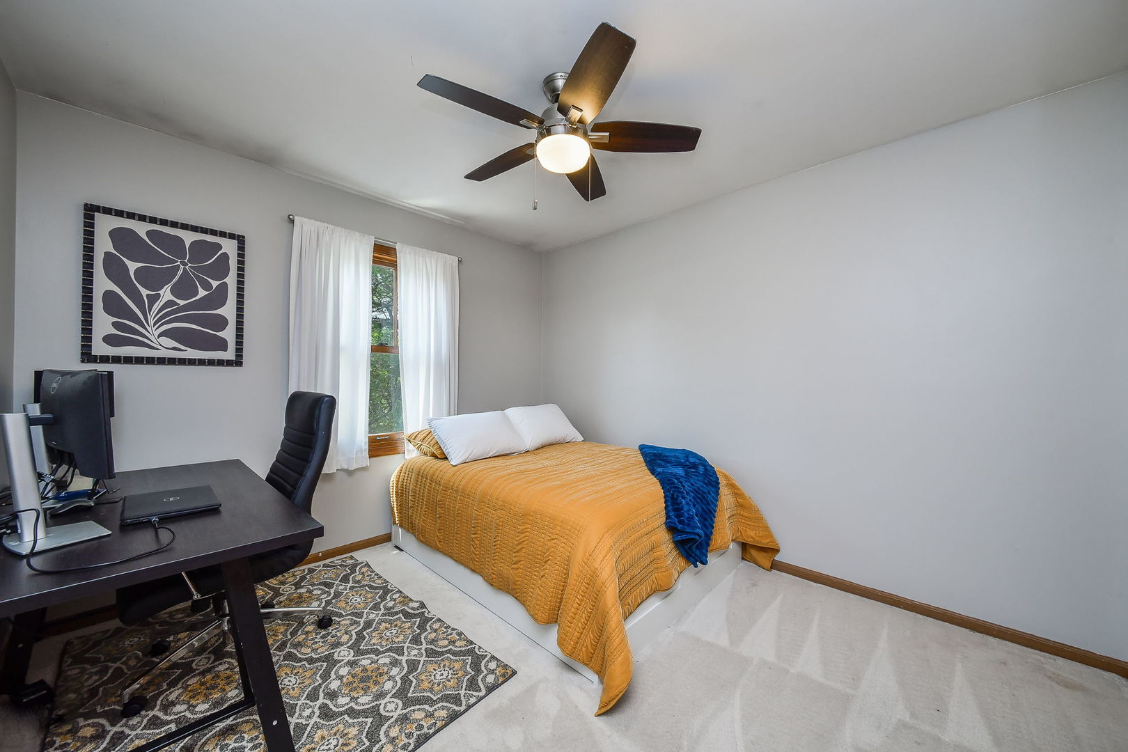 27W108 Walnut Drive Winfield, IL 60190 - Photo 12 of 20 a bedroom with a bed and a desk