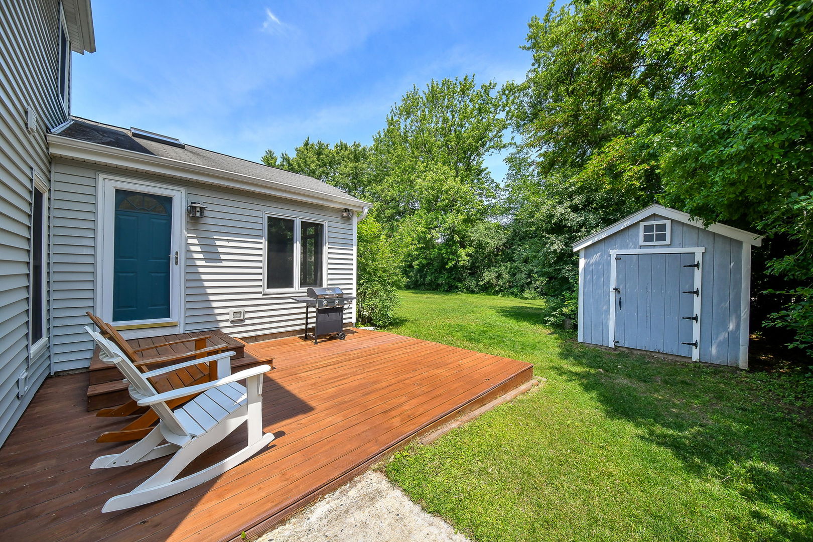 27W108 Walnut Drive Winfield, IL 60190 - Photo 17 of 20 a view of backyard with a deck