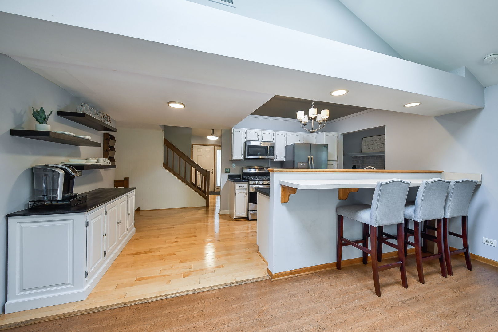 27W108 Walnut Drive Winfield, IL 60190 - Photo 4 of 20 a large kitchen with a table and chairs in it
