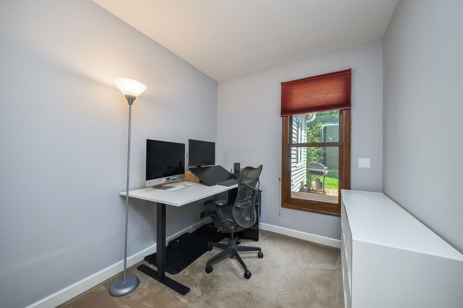 27W108 Walnut Drive Winfield, IL 60190 - Photo 8 of 20 a view of a workspace with furniture and a window