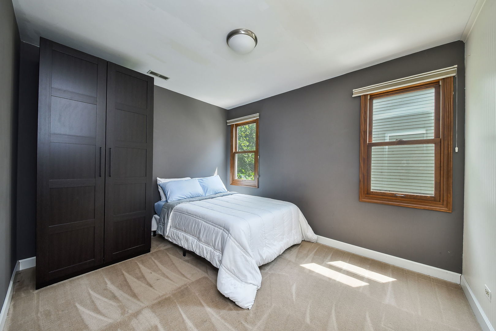 27W108 Walnut Drive Winfield, IL 60190 - Photo 9 of 20 a bedroom with a bed and window