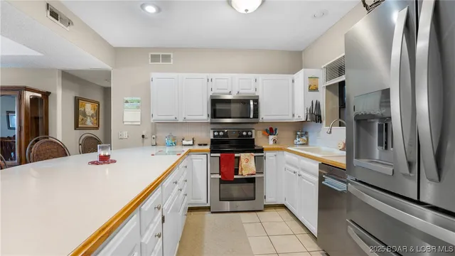 $348,500 | 90 Falls Point Drive, Unit 1B, Lake Ozark, MO 65049