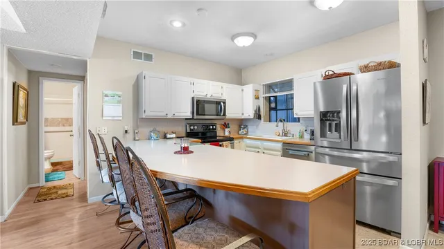 $348,500 | 90 Falls Point Drive, Unit 1B, Lake Ozark, MO 65049