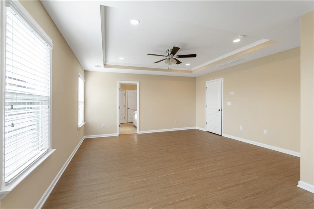 865 Great Glen Place Suwanee, GA 30024 - Photo 35 of 45 a view of an empty room with a window