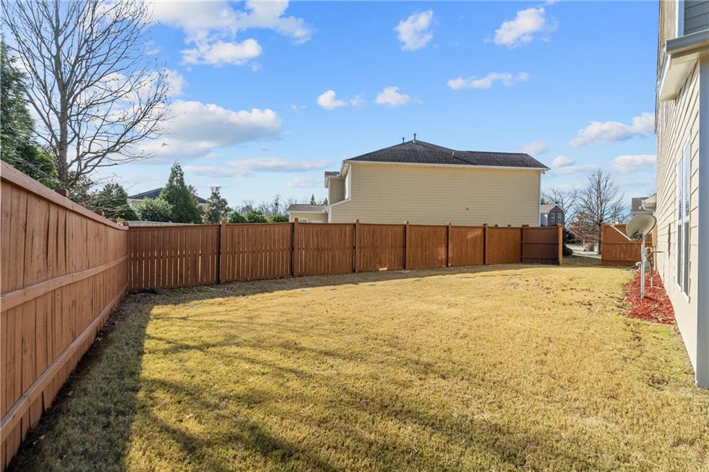 865 Great Glen Place Suwanee, GA 30024 - Photo 45 of 45 a view of a backyard