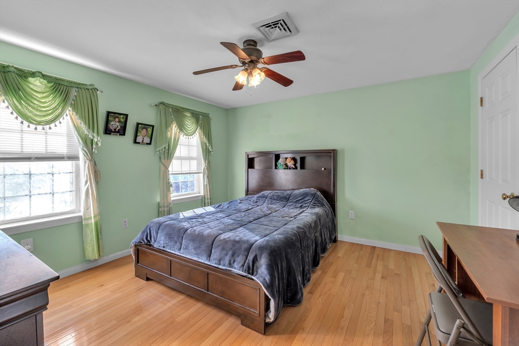 8 Modred Court Worcester, MA 01602 - Photo 17 of 28 a bedroom with a bed and window
