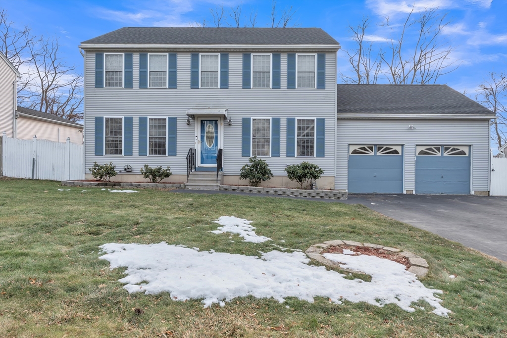 8 Modred Court Worcester, MA 01602 - Photo 2 of 28 a front view of a house with garden