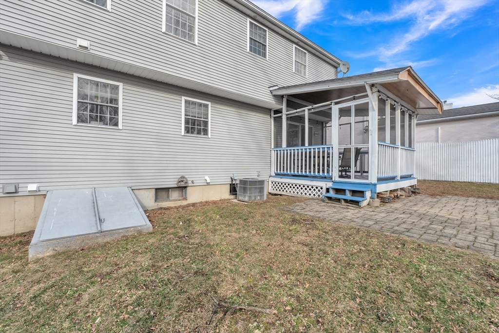 8 Modred Court Worcester, MA 01602 - Photo 4 of 28 a view of a house with wooden floor