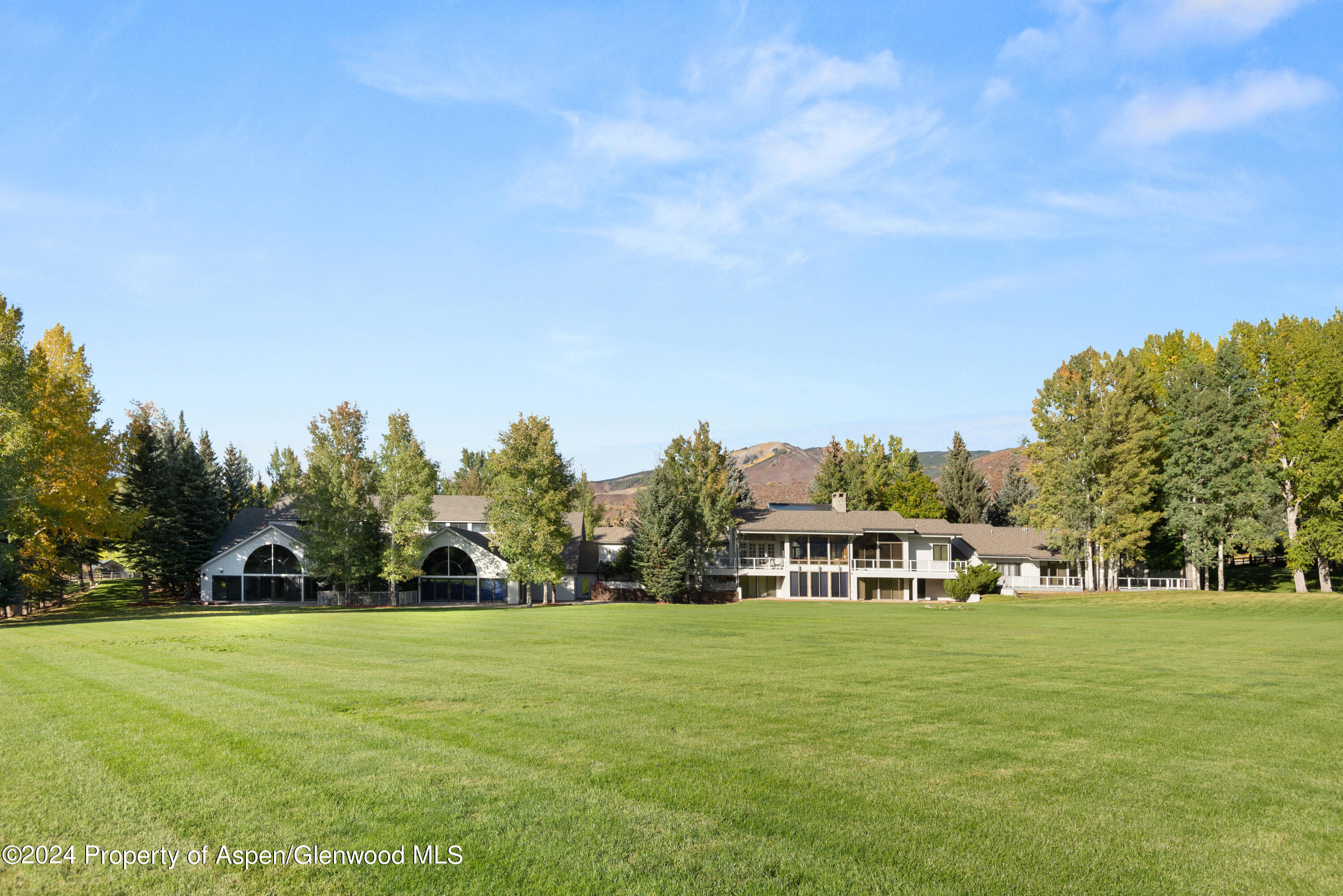 1650 McLain Flats Road Aspen, CO 81611 - Photo 12 of 72 a view of a park with large trees