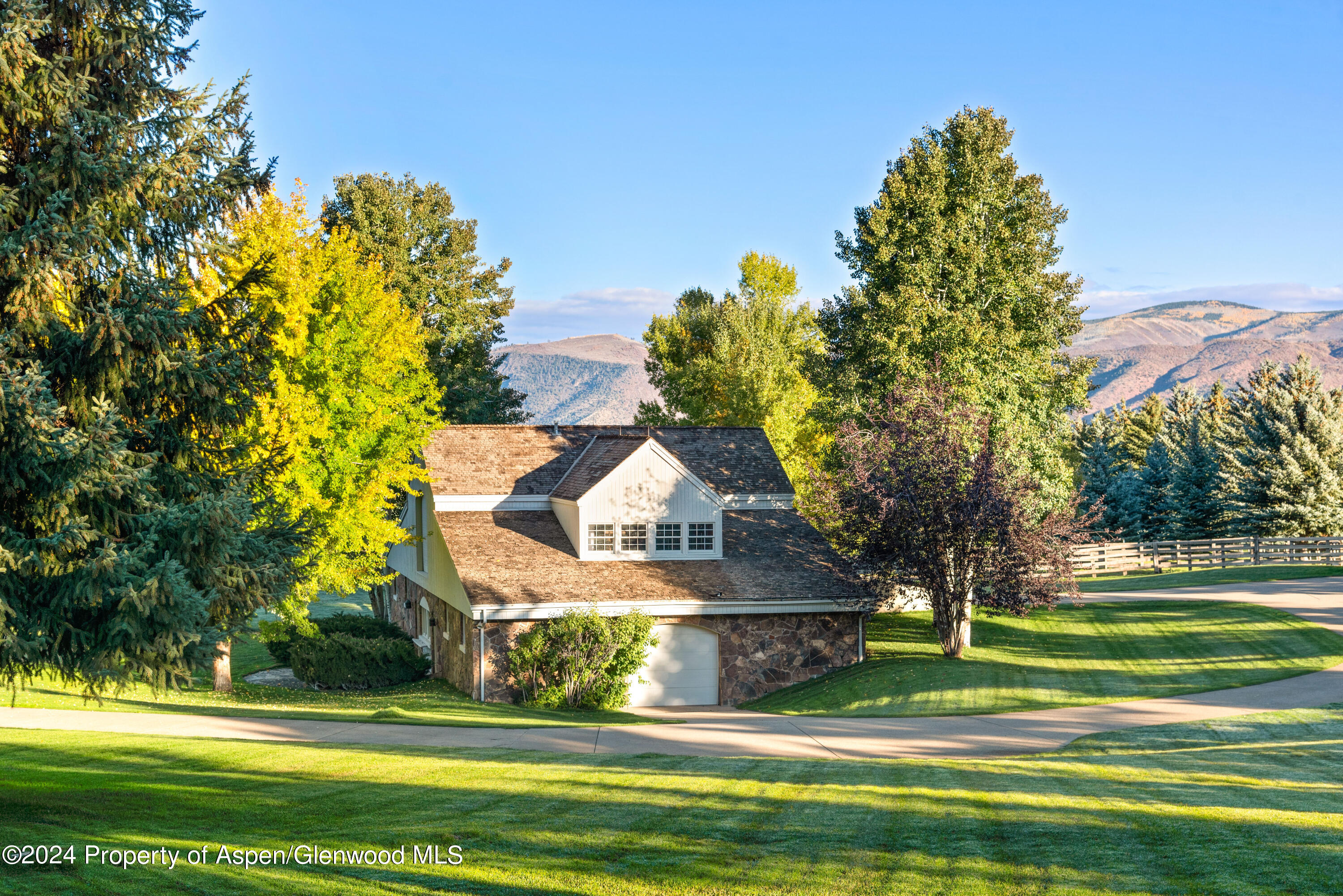 1650 McLain Flats Road Aspen, CO 81611 - Photo 14 of 72 a view of a house with a big yard
