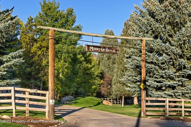 a view of a house with a big yard