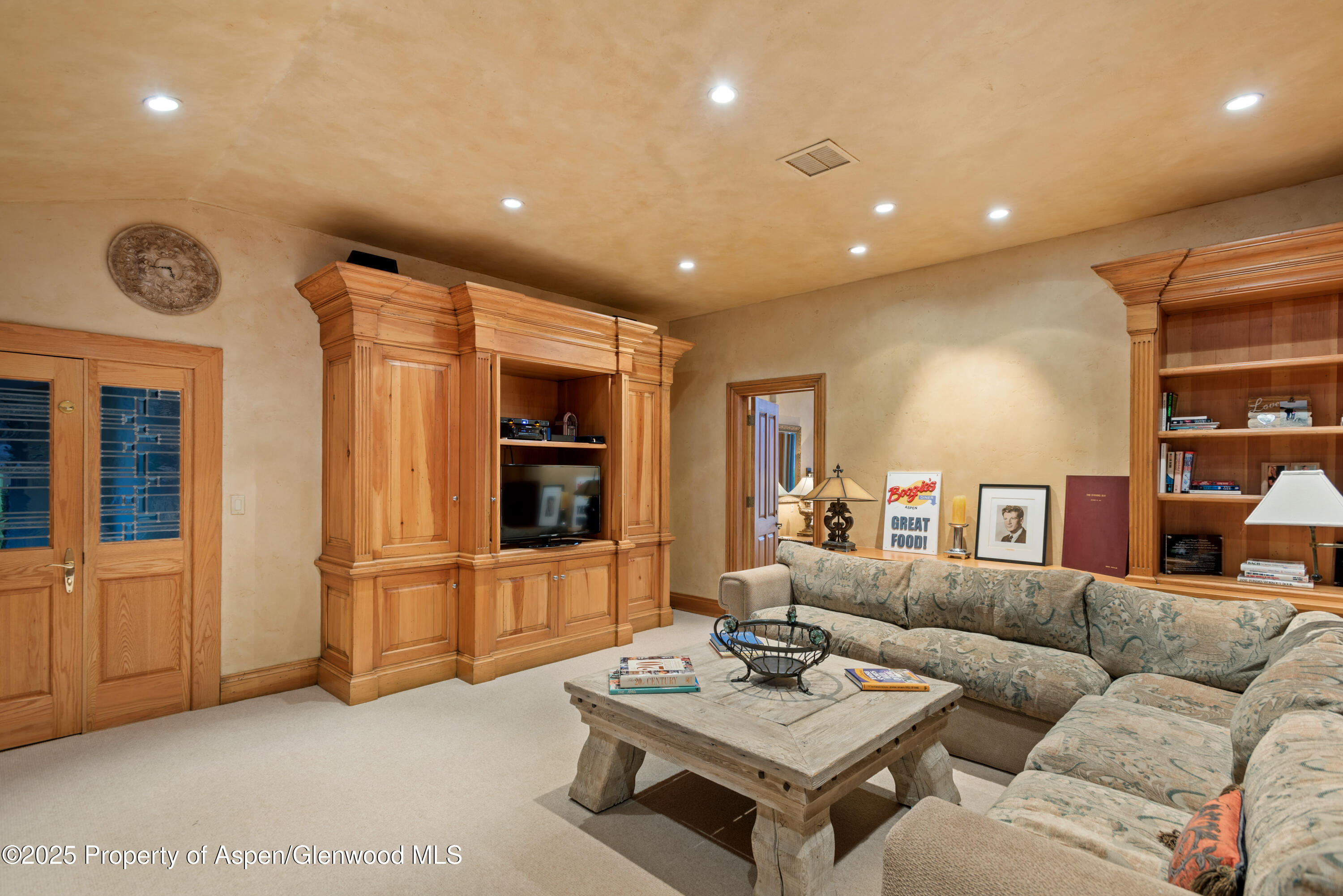 1650 McLain Flats Road Aspen, CO 81611 - Photo 35 of 72 a living room with furniture and a window