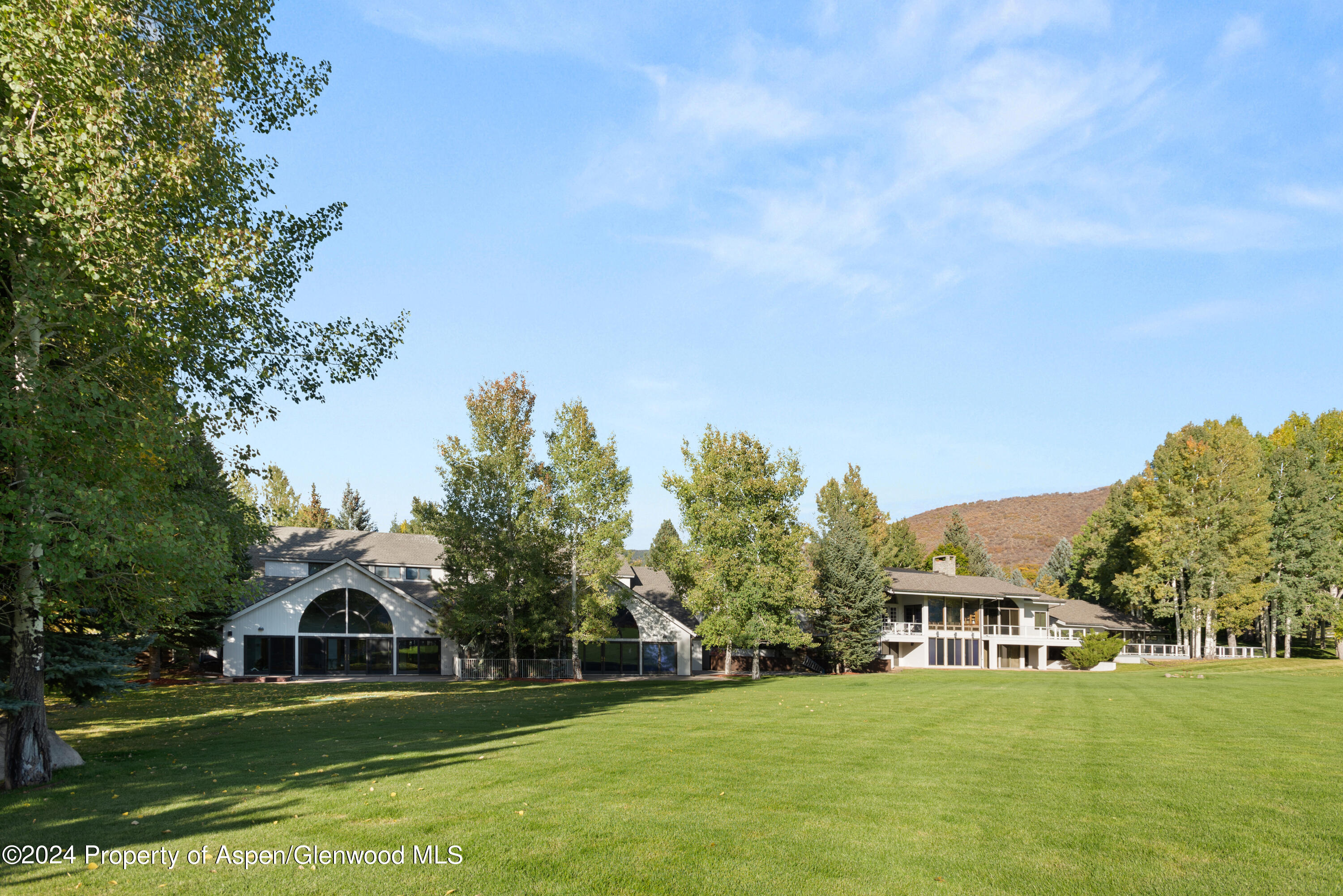 1650 McLain Flats Road Aspen, CO 81611 - Photo 6 of 72 a view of a house with a big yard