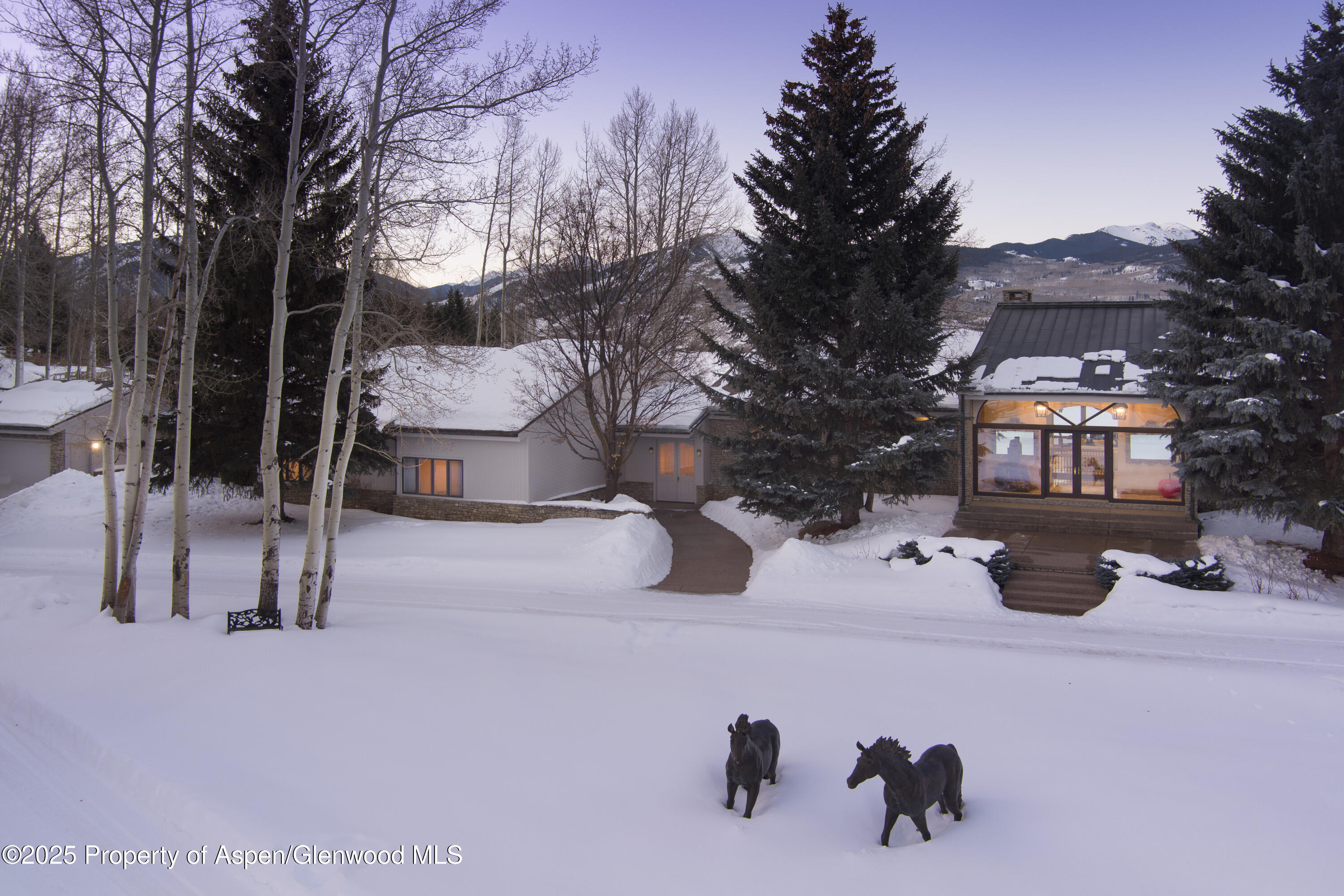 1650 McLain Flats Road Aspen, CO 81611 - Photo 66 of 72 a view of a two chairs in the patio