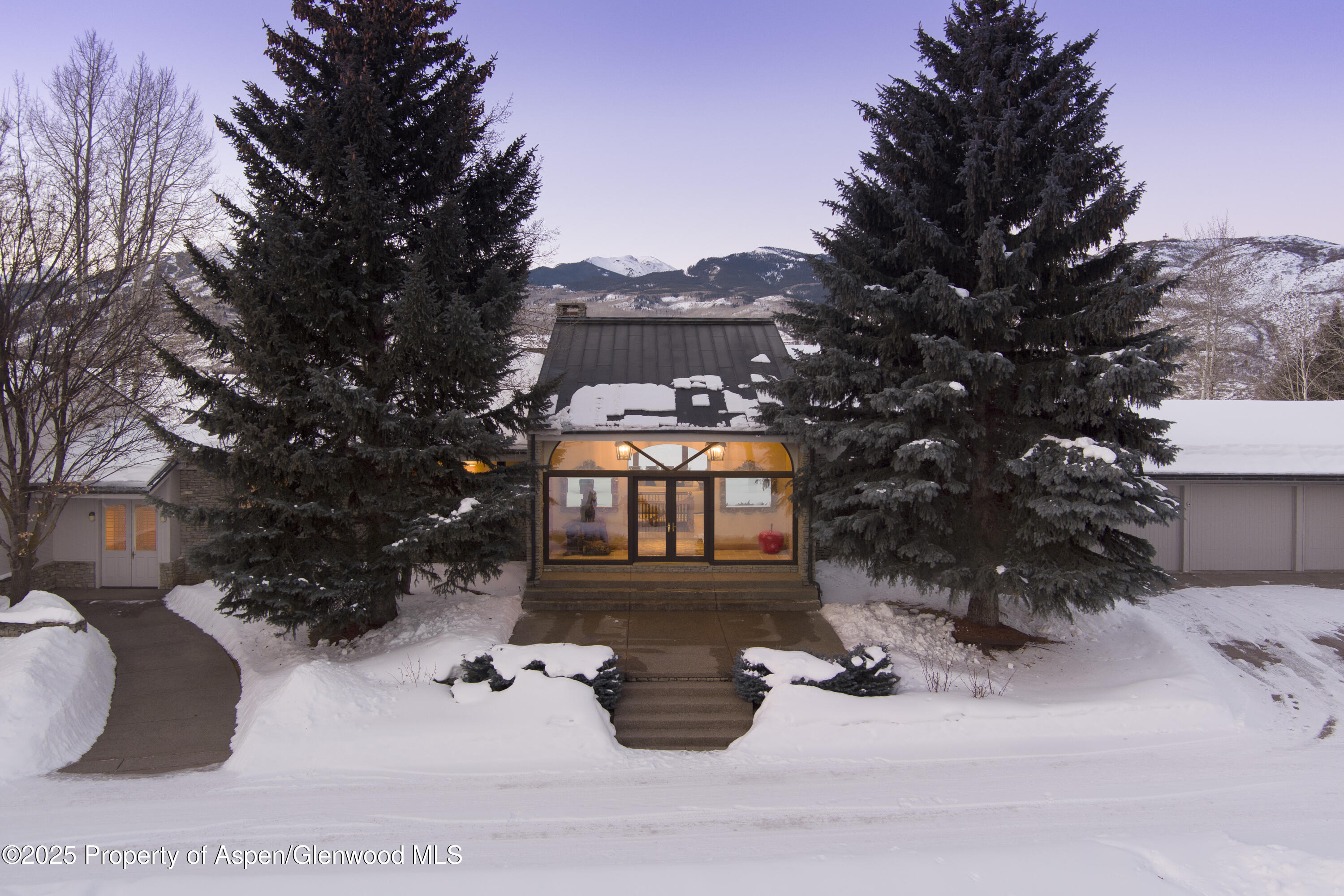 1650 McLain Flats Road Aspen, CO 81611 - Photo 67 of 72 a view of a house with a snow in a yard
