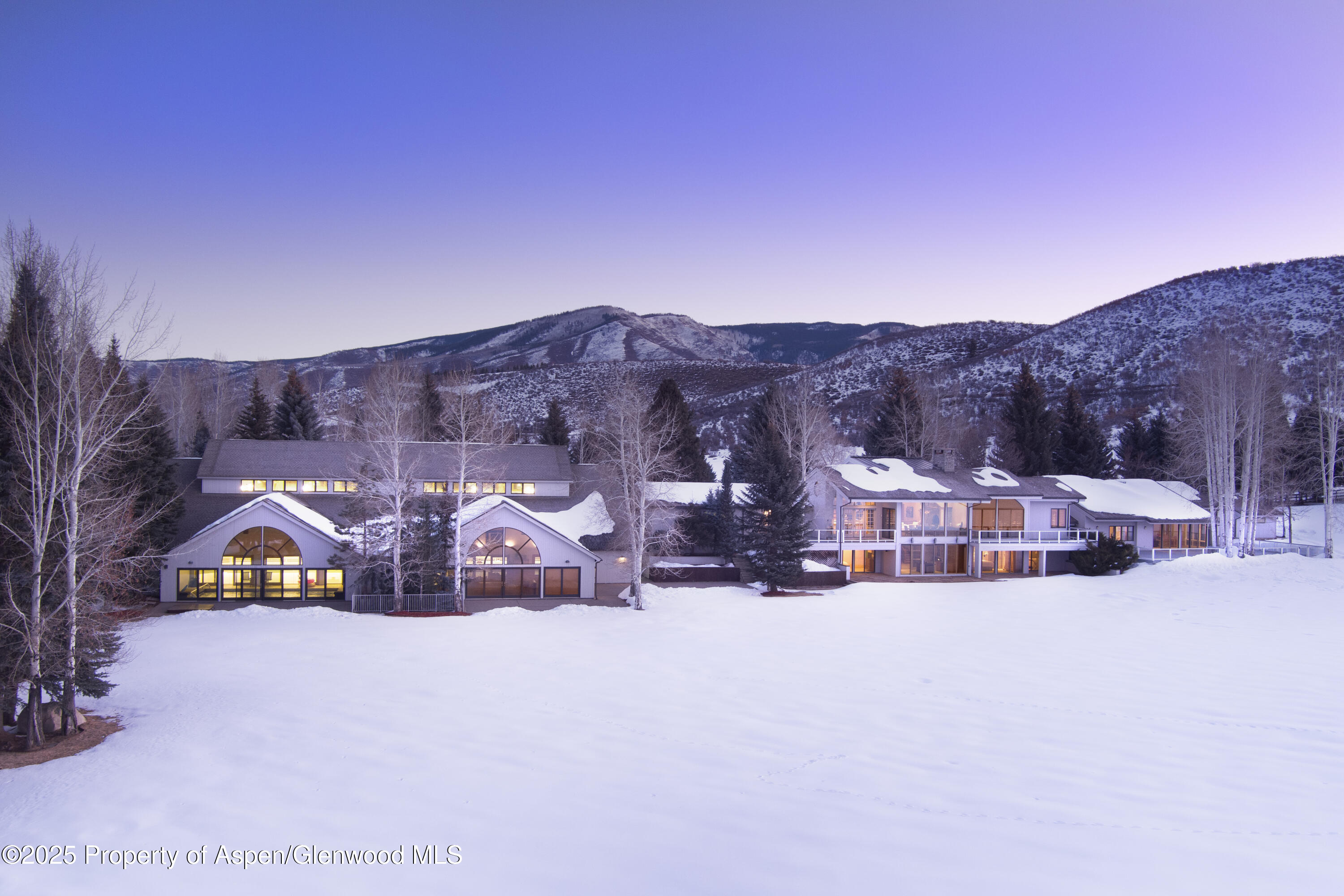 1650 McLain Flats Road Aspen, CO 81611 - Photo 70 of 72 a view of a house with a yard covered in snow