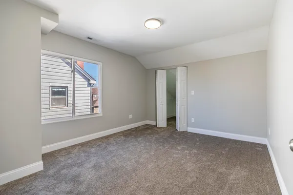 a view of a room with racks on the wall