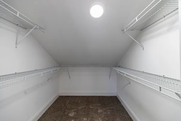 a bathroom with a sink vanity tub and shower