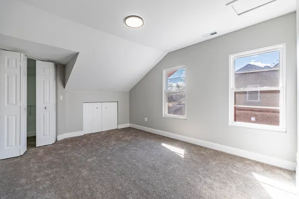 a view of a room with racks on the wall