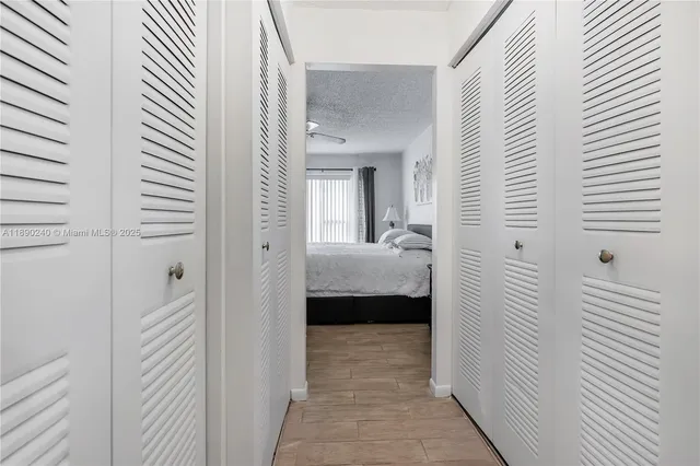 a view of a bathroom from a hallway