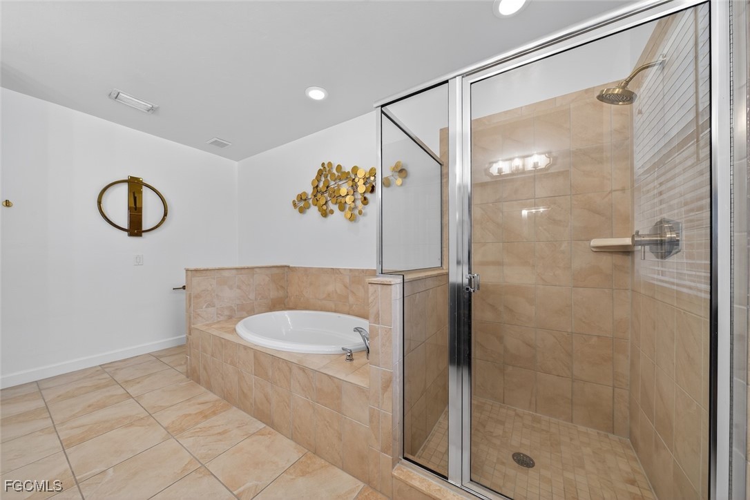 13570 Harbour Ridge Drive Fort Myers, FL 33908 - Photo 30 of 50 a bathroom with a shower and a sink