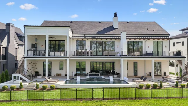a front view of house with yard and outdoor seating