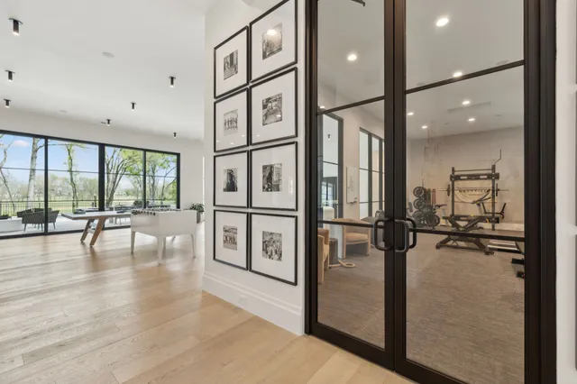 a view of living room with furniture and floor to ceiling window