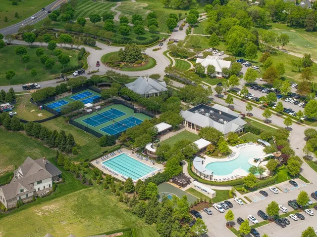 an aerial view of residential house with outdoor space