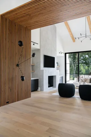 a view of a patio with couches and potted plants