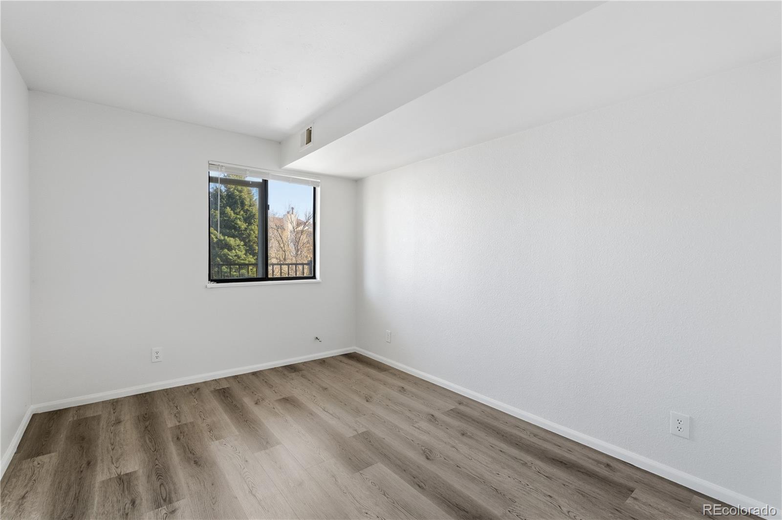 481 South Kalispell Way, Unit 306 Aurora, CO 80017 - Photo 16 of 43 an empty room with a window