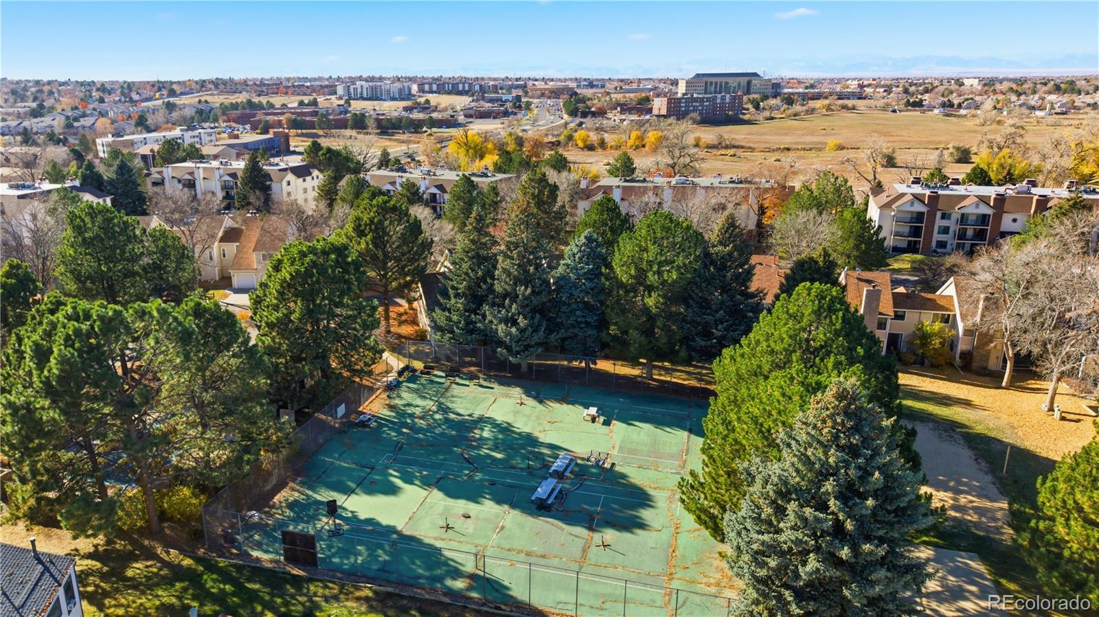 481 South Kalispell Way, Unit 306 Aurora, CO 80017 - Photo 36 of 43 an aerial view of residential houses with outdoor space
