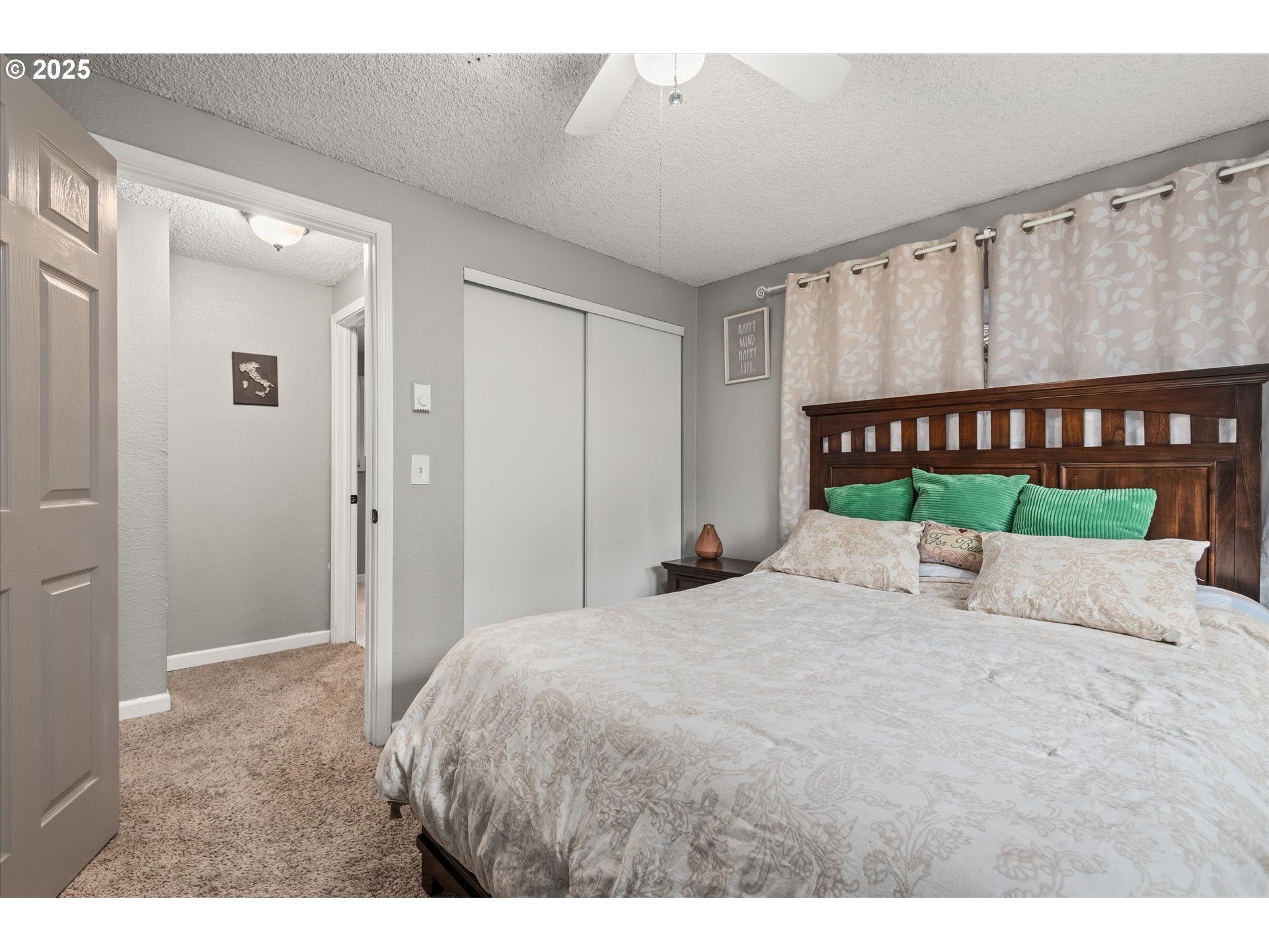 24795 Parkside Drive Veneta, OR 97487 - Photo 21 of 42 a bedroom with a bed and a table