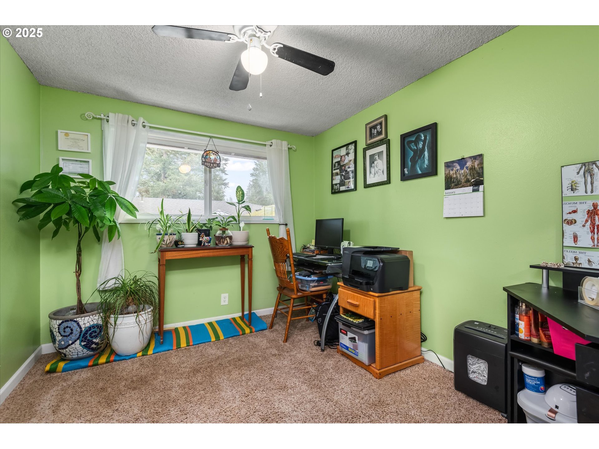 24795 Parkside Drive Veneta, OR 97487 - Photo 25 of 42 a room with furniture and a large window