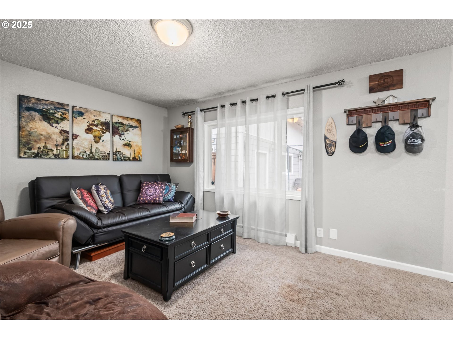 24795 Parkside Drive Veneta, OR 97487 - Photo 28 of 42 a living room with furniture and a window