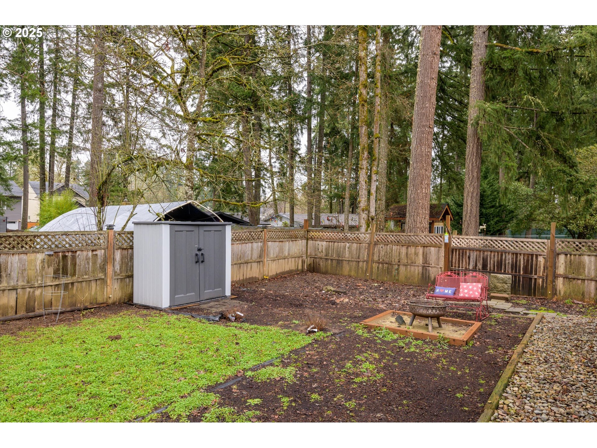 24795 Parkside Drive Veneta, OR 97487 - Photo 32 of 42 a backyard of a house with table and chairs