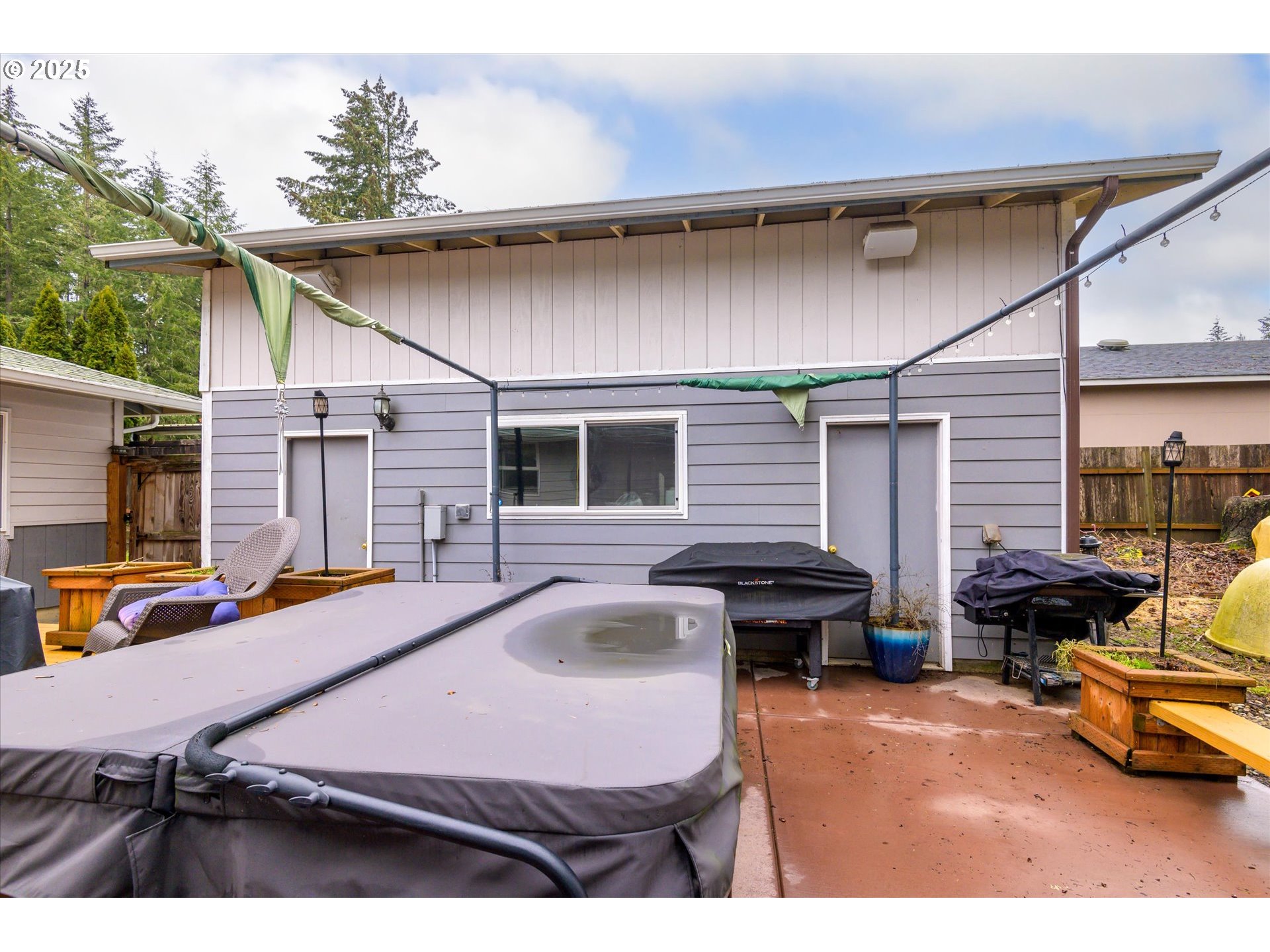 24795 Parkside Drive Veneta, OR 97487 - Photo 35 of 42 a backyard of a house with barbeque oven and outdoor seating