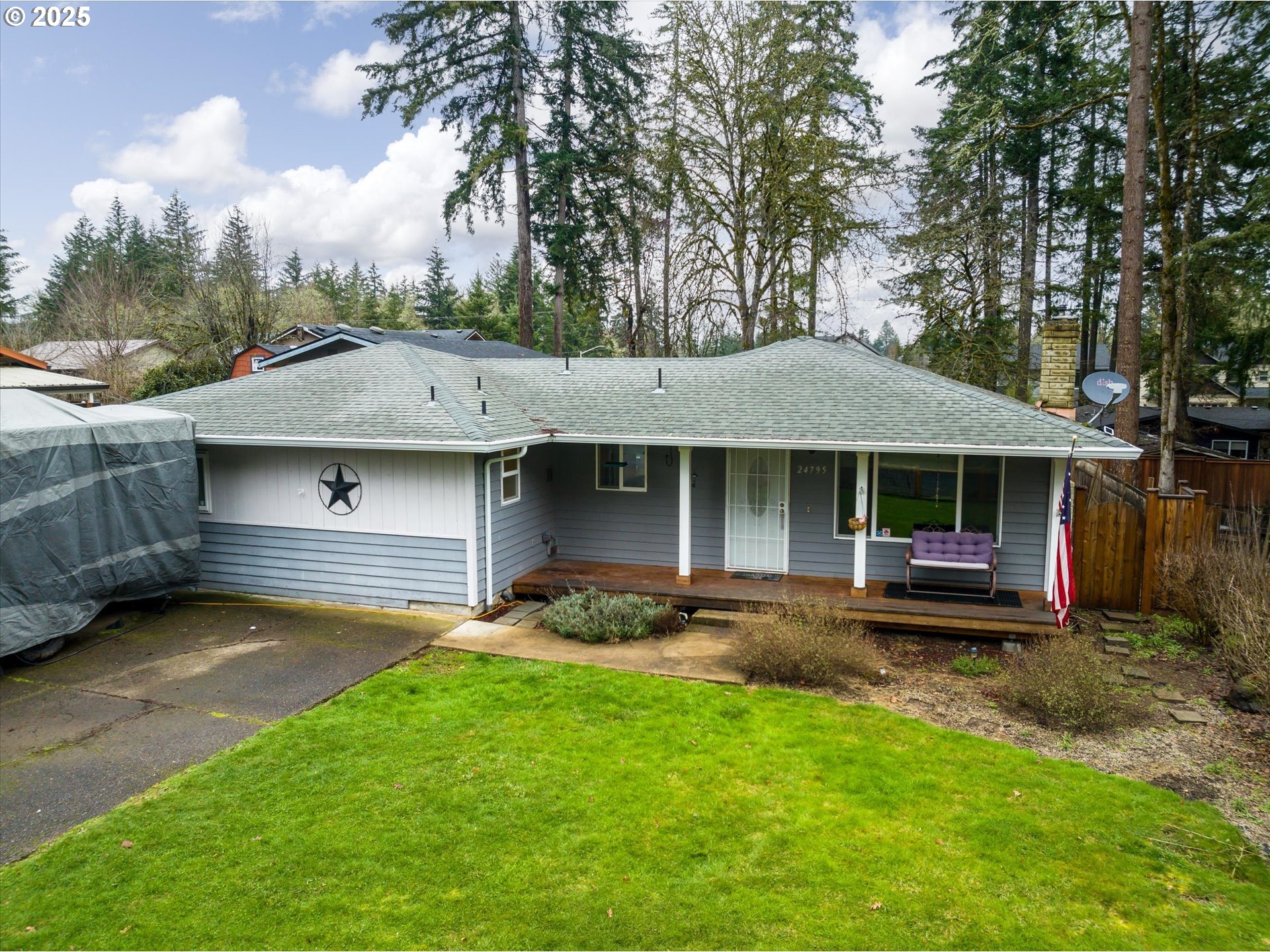 24795 Parkside Drive Veneta, OR 97487 - Photo 36 of 42 a front view of a house with a garden and trees